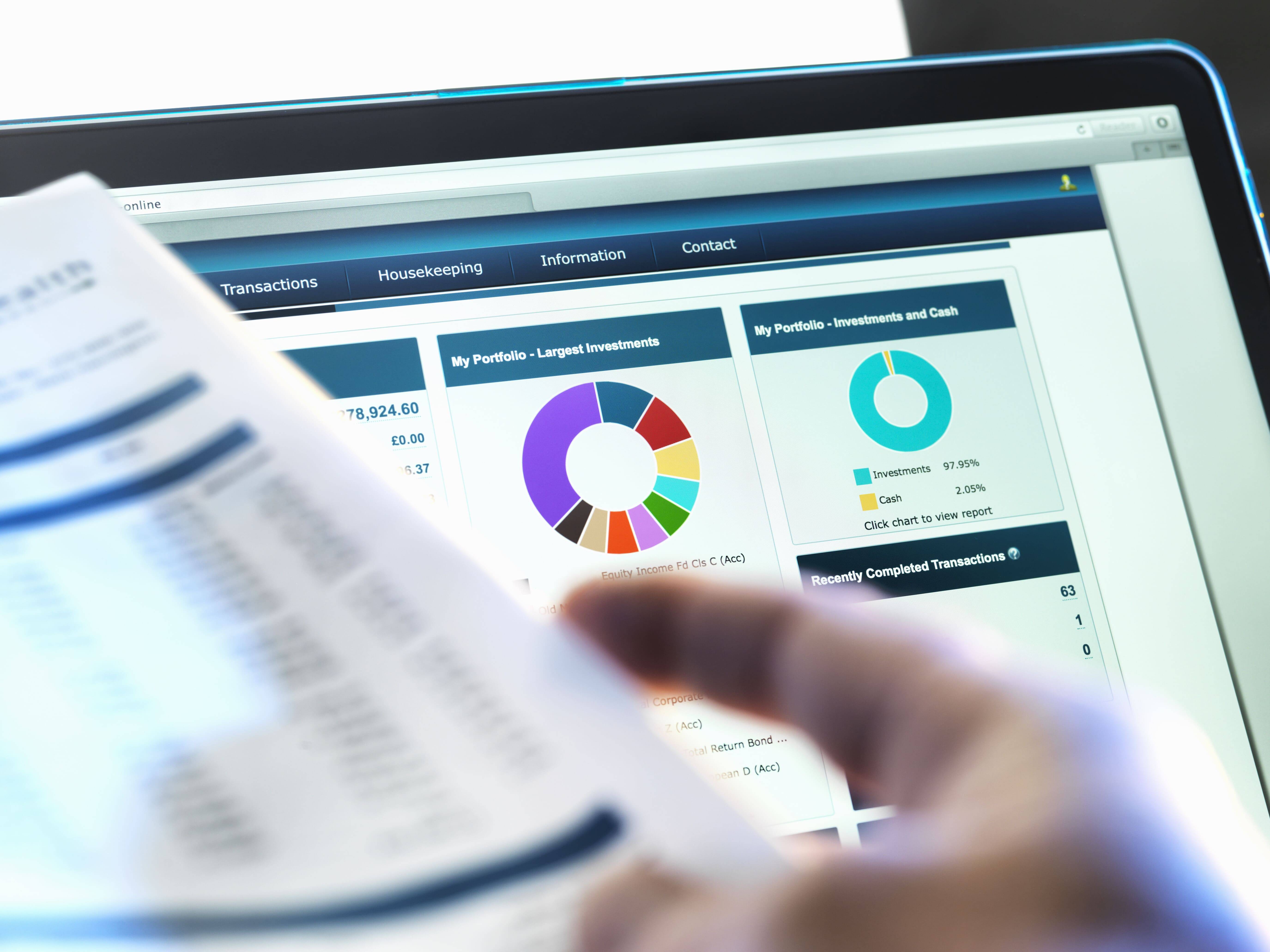 investor-checking-performance-of-financial-portfol-2024-06-12-20-28-16-utc (1)